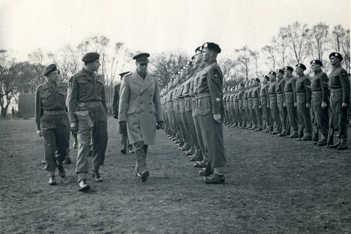 The King inspects the Guard of Honour of the 7th (Airborne) Battalion, The King’s Own Scottish Borderers