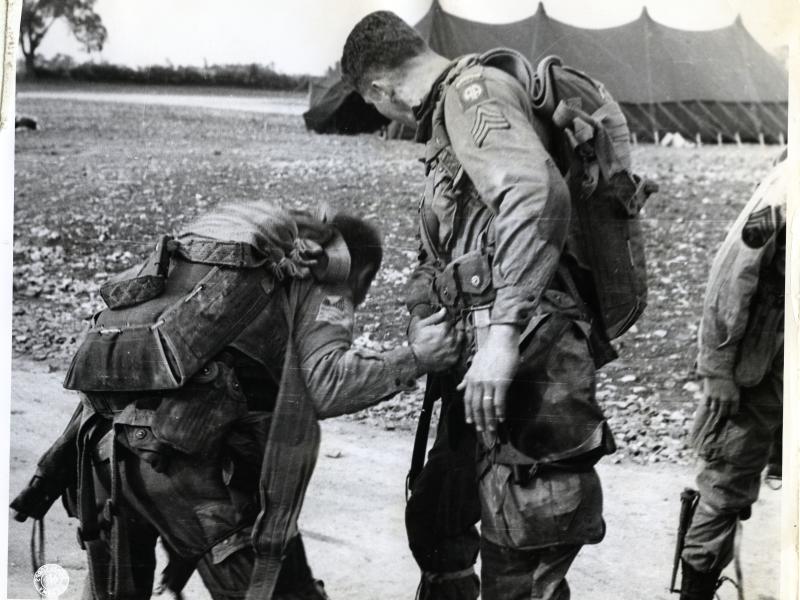 Paratroopers check their equipment at Saltby airfield before D-Day