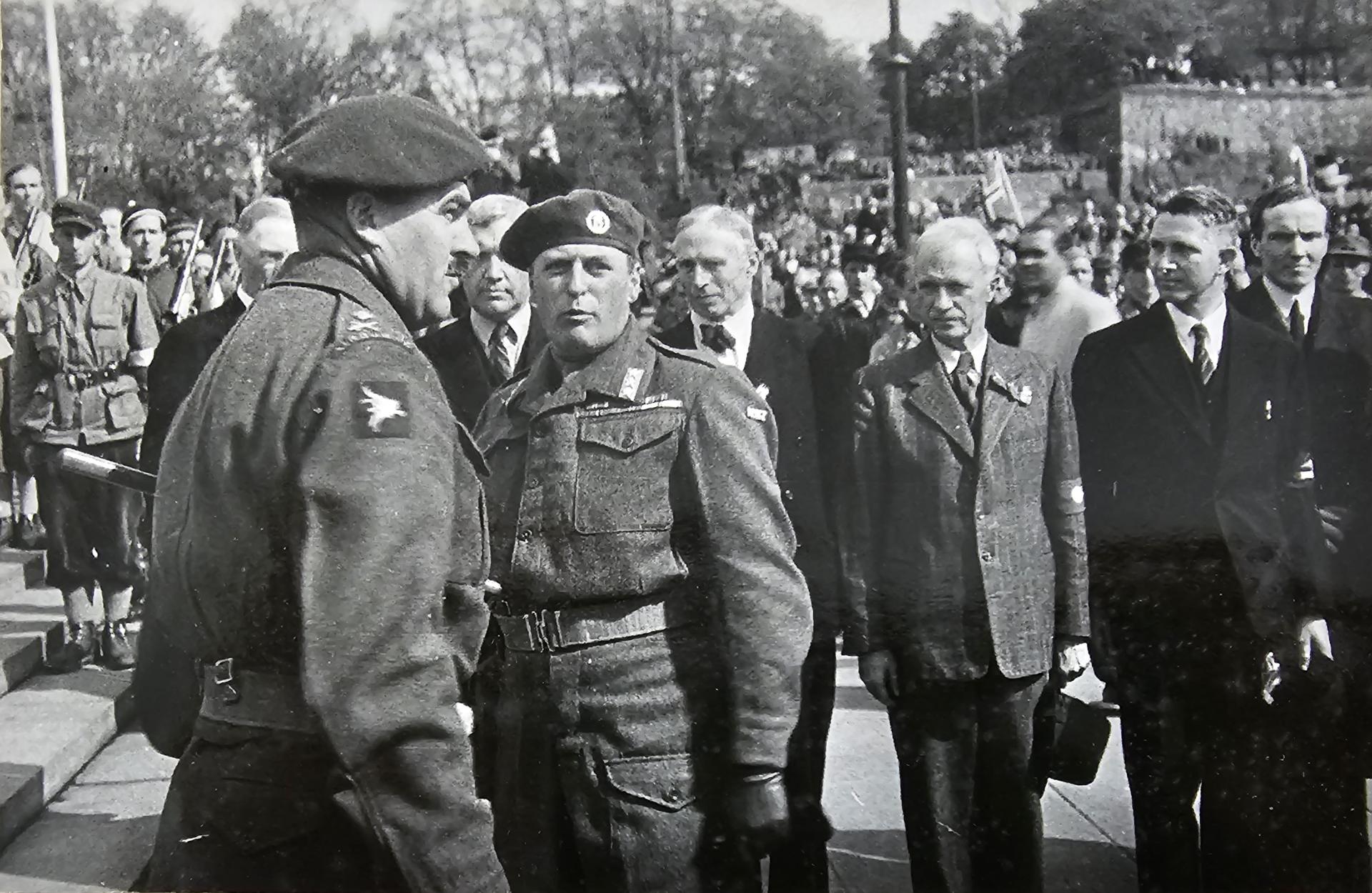 Oslo, 13 May 1945: Major General Urquhart welcomes HRH Crown Prince Olav and five government ministers on their return to Norway.