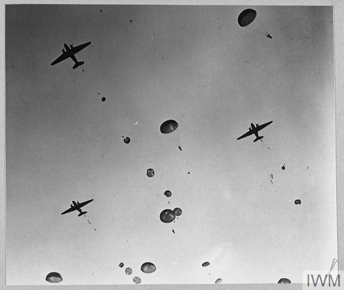 Paratroops dropping from C-47 aircraft