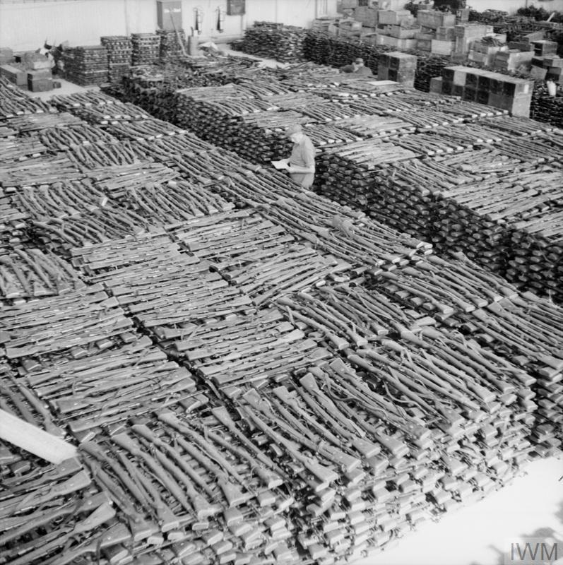 Storeroom at Stavanger Sola airfield, with some of the estimated 30,000 rifles taken from German forces in Norway after their surrender