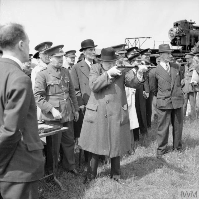 Churchill takes aim with a sten gun