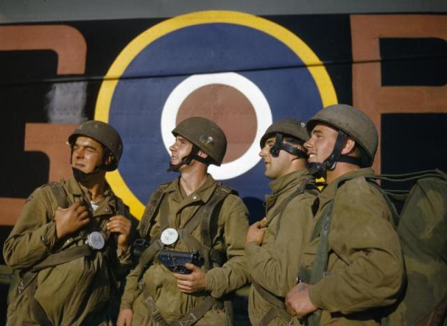 British paratroopers next to a Whitley aircraft