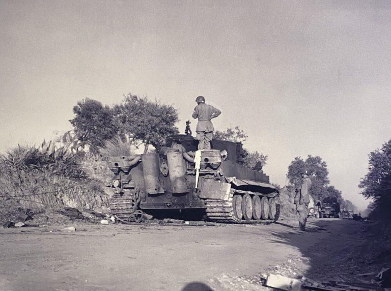 82nd Airborne paratroopers inspect a German Tiger tank on Sicily.