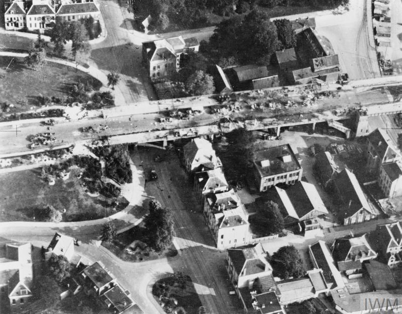 German vehicles lie wrecked at the northern end of the Arnhem road bridge