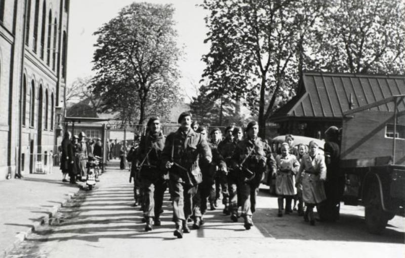 British paratroopers enter the Carlsberg Breweries in Copenhagen to help Danish Resistance Forces collecting German prisoners