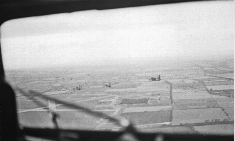 A view from the cockpit as C-47 aircraft fly over Saltby airfield