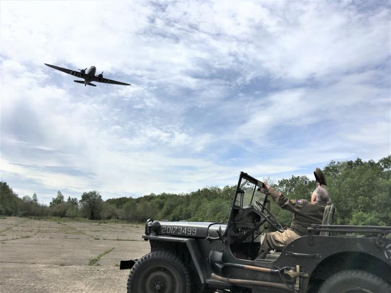 David Hamilton watches a C-47 fly over North Witham airfield