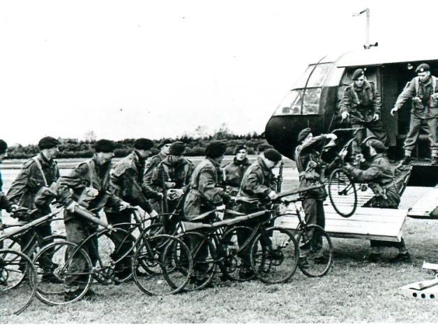 Troops load folding bicycles onto a Horsa glider